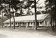 Hine: Housing, 1911 - Photograph of Peerless Oyster Co. Camp
