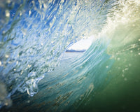 View Through The Barrel Of A Wave to Kenai Mountains Poster Print by Scott Dickerson