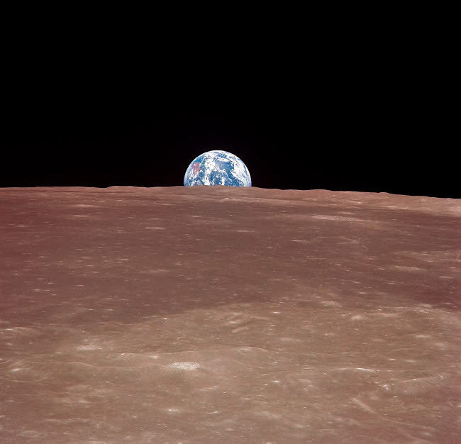 Earth Rising Above the Moon's Horizon Fine Art Print by Stocktrek Images