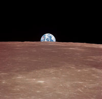 Earth Rising Above the Moon's Horizon Fine Art Print by Stocktrek Images