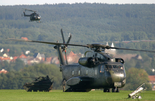 German CH-53G Helicopter Unloading Wiesel Armored Vehicle Fine Art Print by Timm Ziegenthaler