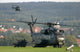 German CH-53G Helicopter Unloading Wiesel Armored Vehicle Fine Art Print by Timm Ziegenthaler