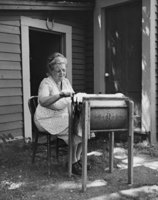 Senior Woman Churning Butter Fine Art Print