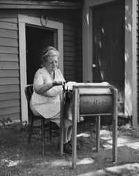 Senior Woman Churning Butter Fine Art Print