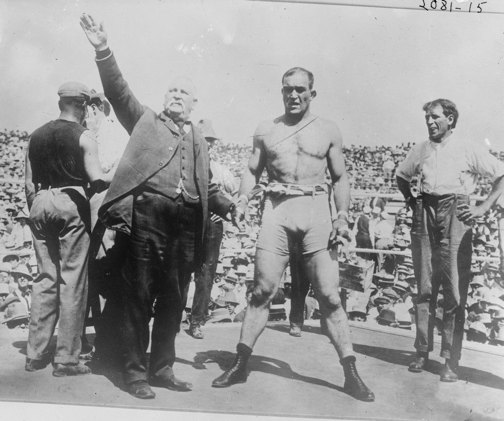 Boxer and Announcer in Boxing Ring Fine Art Print
