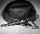Close-Up of a Revolver and a Hat Fine Art Print