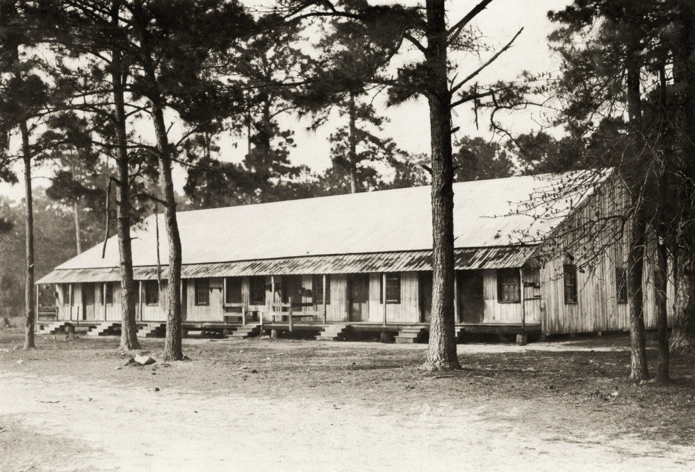 Hine: Housing, 1911 - Photograph of Peerless Oyster Co. Camp