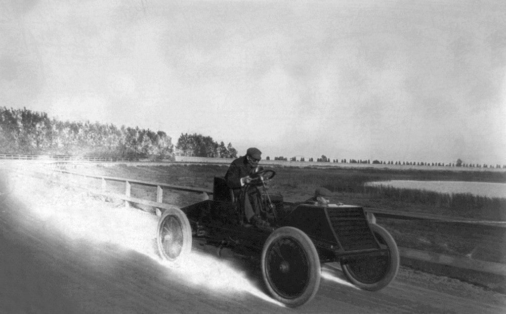 Alexander Winton Driving His Auto on a Racetrack, c. 1901 - Fine Art Print