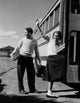 Teenage Girl and Boy Boarding School Bus Poster Print