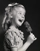 Side Profile of a Girl Holding an Ice Cream Fine Art Print