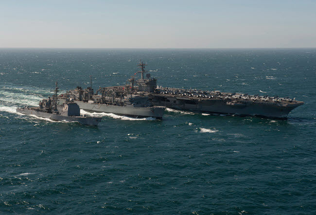 Underway Replenishment at Sea with US Navy Ships in the Arabian Gulf Fine Art Print by Stocktrek Images