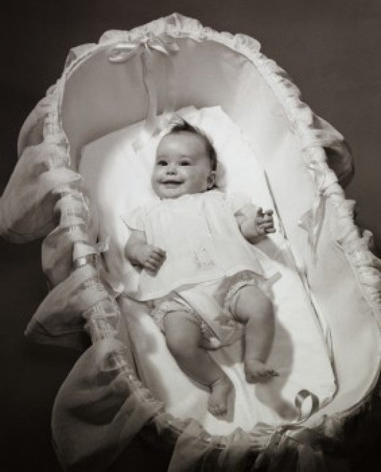 High Angle View of a Baby Girl in a Bassinet Fine Art Print