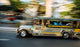 Jeepney Moving on the Road Fine Art Print - Manila, Philippines