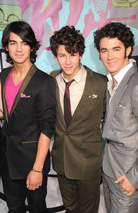 Joe, Nick, and Kevin Jonas at Camp Rock Premiere Photo Print