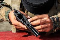 US Marine Assembling the M9 Pistol Fine Art Print by Stocktrek Images