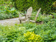 Adirondack Chairs on a Garden Patio Fine Art Print by Julie Eggers
