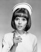 Portrait of a Female Nurse Pointing Fine Art Print