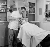 Barber Shaving a Man in a Hair Salon Fine Art Print