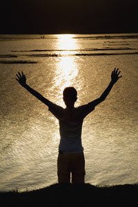 Child Stretching Arms To The Sky Fine Art Print by Sean White