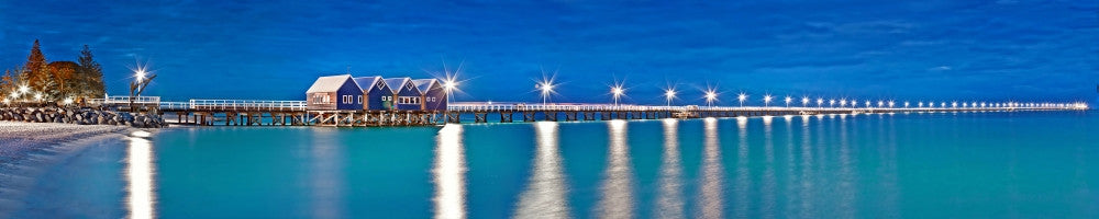 Illuminated Busselton Jetty over the Pacific Ocean Poster Print