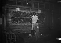 African American Teacher at the Blackboard - Mt. Gilead School Poster Print