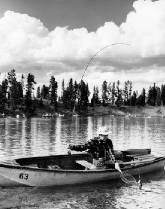 Mid Adult Man Fishing from a Rowboat Fine Art Print