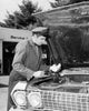 Auto Mechanic Repairing Car at Service Station Fine Art Print