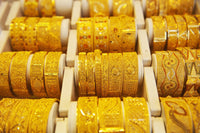 Gold Bangles in Gold Souk, Dubai Poster Print