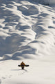 Person Snowboarding in the Mountains of Southeast Alaska Fine Art Print by Dean Blotto Gray