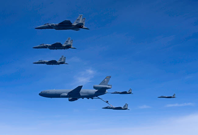 Six F-15 Eagles Refueling from a KC-10 Extender Fine Art Print by HIGH-G Productions