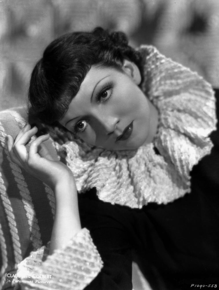 Claudette Colbert looking away in elegant black dress portrait photo print