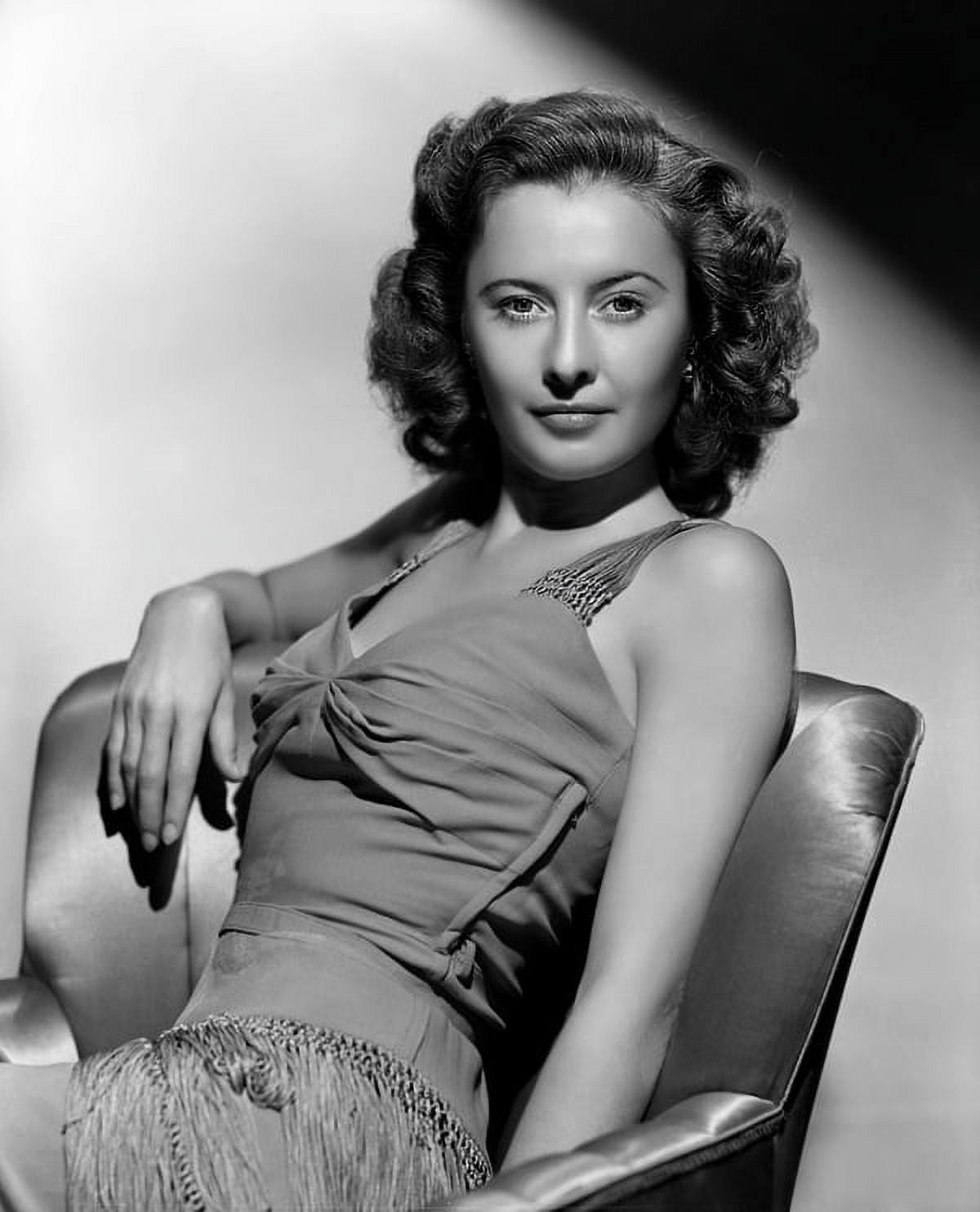 Barbara Stanwyck Leaning Back Photo Print showcasing vintage Hollywood charm.