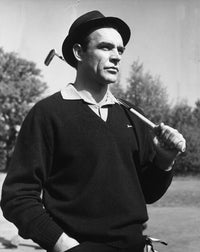 Sean Connery holding a golf club in Goldfinger photo print