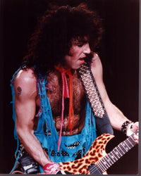Paul Stanley on stage in ripped shirt photo print