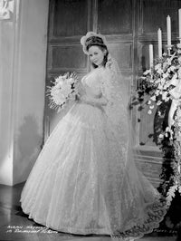 Susan Hayward posed in a wedding dress photo print.