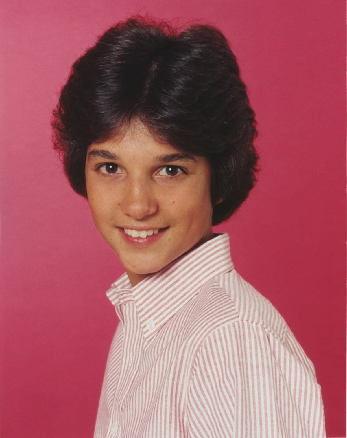 Ralph Macchio smiling in polo with red background photo print