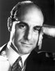 Stanley Tucci close-up photo print in black suit, perfect for home décor.