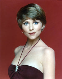 Lauren Tewes posed elegantly in a brown dress photo print