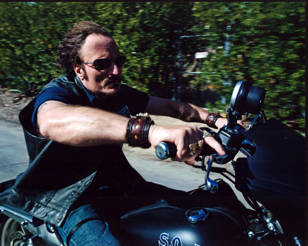 Kim Coates riding a motorcycle on the set of Sons of Anarchy photo print.