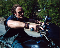 Kim Coates riding a motorcycle on the set of Sons of Anarchy photo print.