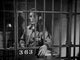 Bing Crosby posed in jail wearing a prisoner uniform portrait photo print