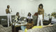 The Bee Gees photo print featuring two women in a living room setting, available in multiple sizes.
