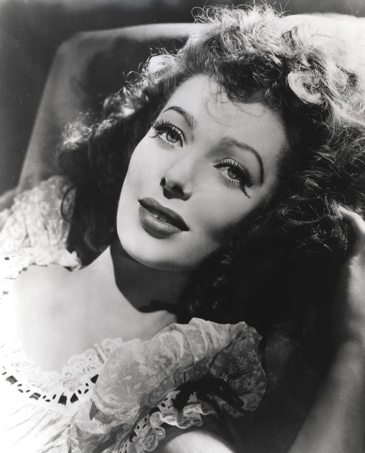 Loretta Young portrait lying with curly hair photo print