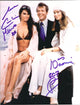 Caroline Munro sitting on Roger Moore's lap photo print.