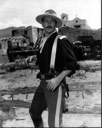Black and white photo print of John Wayne on the set of Rio Grande.