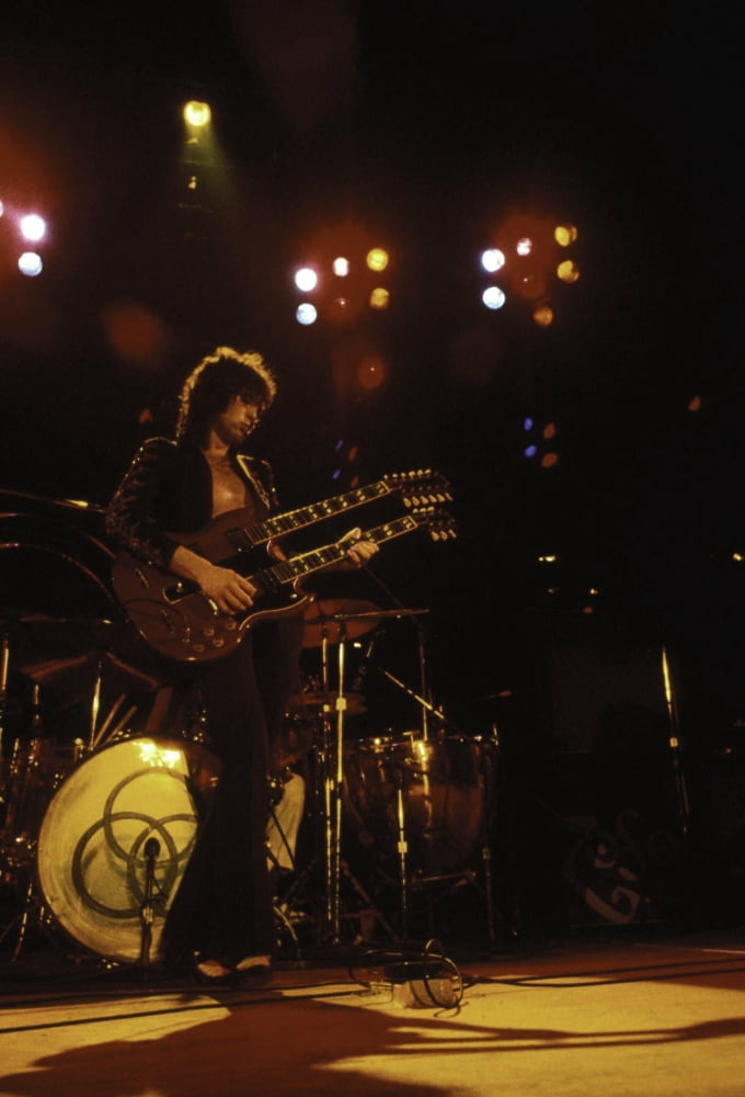 Jimmy Page performing live photo print, capturing the energy of rock music.