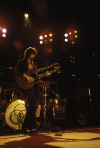 Jimmy Page performing live photo print, capturing the energy of rock music.
