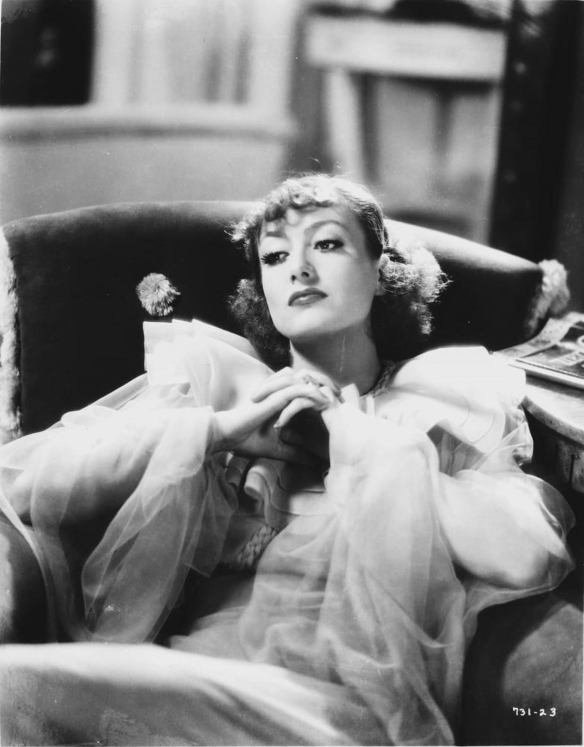 Joan Crawford lying on a sofa classic photo print.