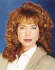 Close-up portrait photo print of Julianne Phillips showcasing curly hair.