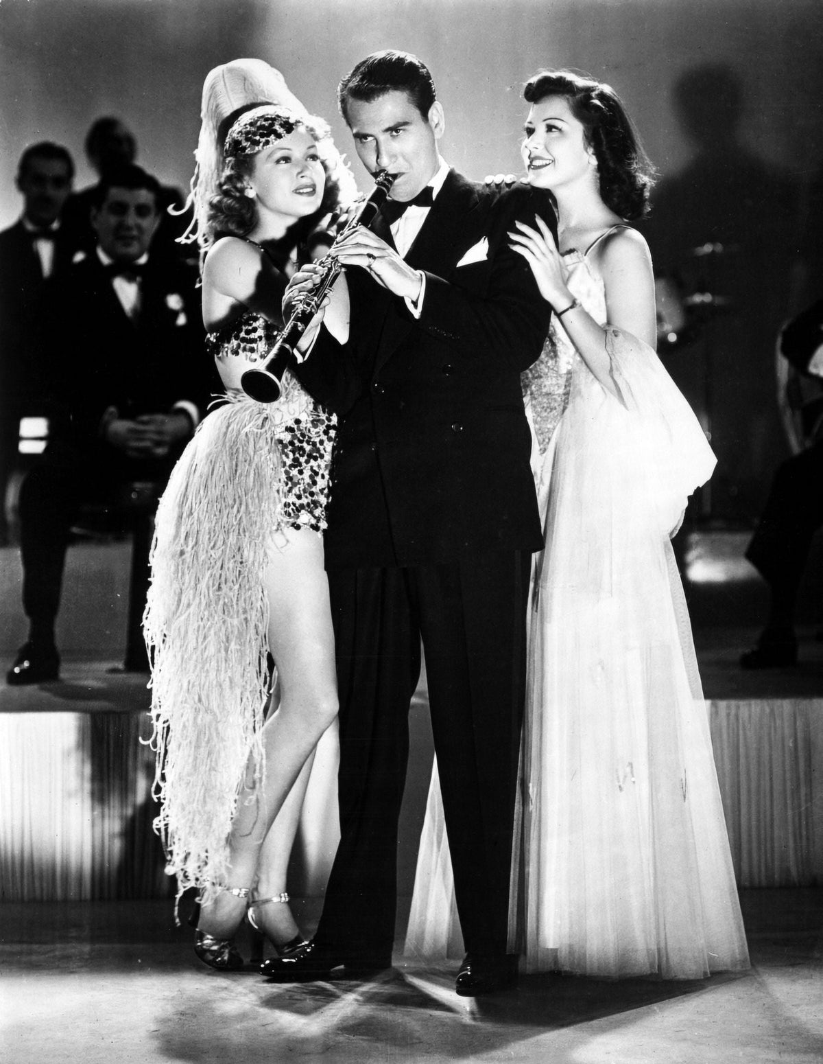 Artie Shaw playing flute with two girls photo print